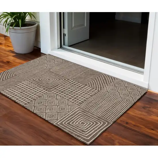 Brown And Ivory Geometric Washable Indoor Outdoor Area Rug Photo 1