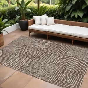 Photo of Brown And Ivory Geometric Washable Indoor Outdoor Area Rug