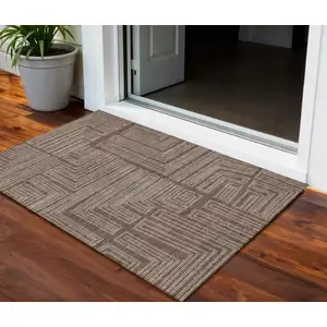 Photo of Brown And Ivory Geometric Washable Indoor Outdoor Area Rug