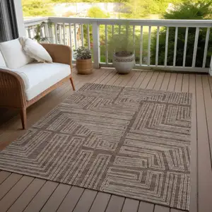 Photo of Brown And Ivory Geometric Washable Indoor Outdoor Area Rug