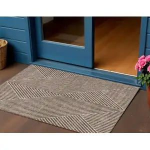 Photo of Brown And Ivory Geometric Washable Indoor Outdoor Area Rug