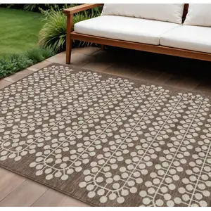 Photo of Brown And Ivory Geometric Washable Indoor Outdoor Area Rug