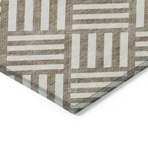 Photo of Brown And Ivory Geometric Washable Indoor Outdoor Area Rug