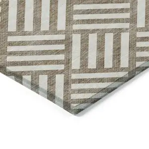 Photo of Brown And Ivory Geometric Washable Indoor Outdoor Area Rug