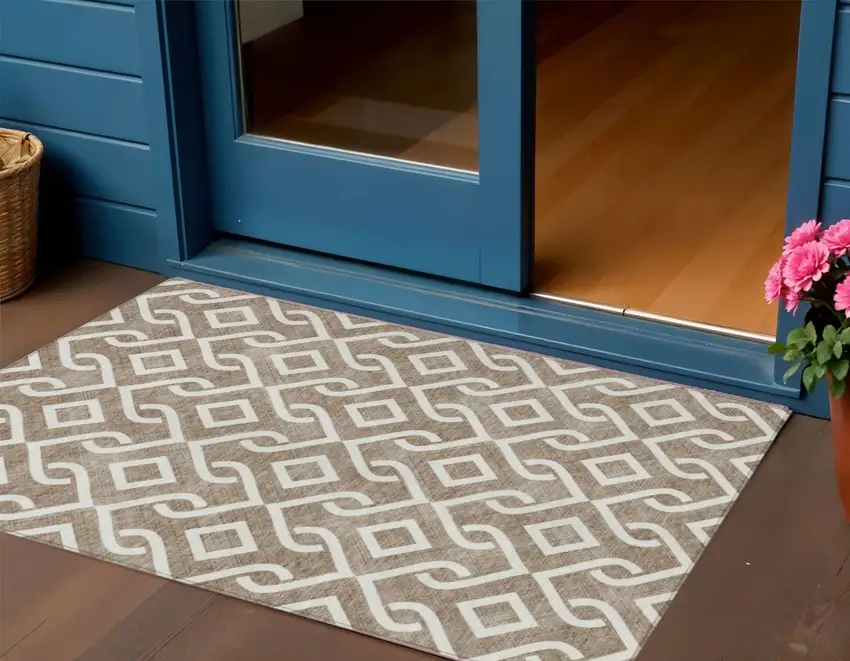 Brown And Ivory Geometric Washable Indoor Outdoor Area Rug Photo 1