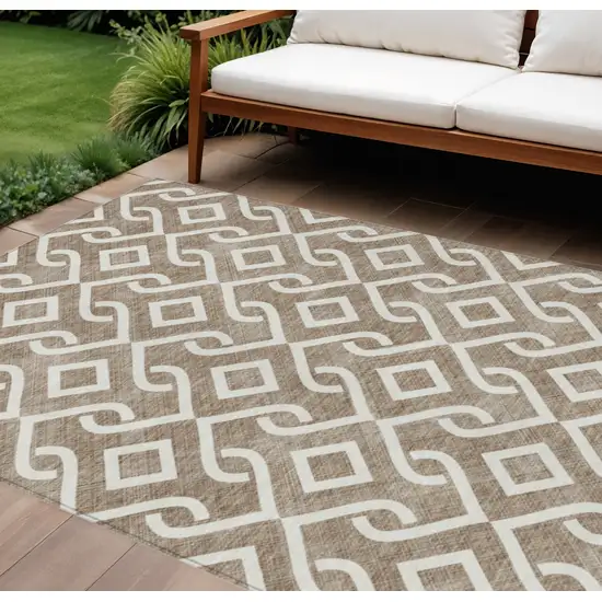 Brown And Ivory Geometric Washable Indoor Outdoor Area Rug Photo 1