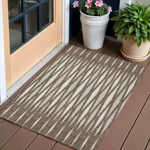 Photo of Brown And Ivory Geometric Washable Indoor Outdoor Area Rug