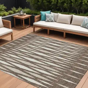 Photo of Brown And Ivory Geometric Washable Indoor Outdoor Area Rug