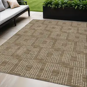 Photo of Brown And Ivory Geometric Washable Indoor Outdoor Area Rug