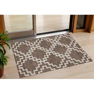 Photo of Brown And Ivory Geometric Washable Indoor Outdoor Area Rug