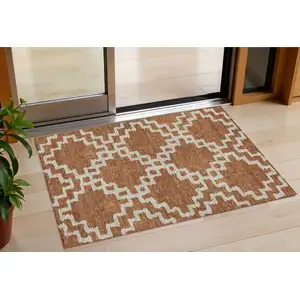 Photo of Brown And Ivory Geometric Washable Indoor Outdoor Area Rug