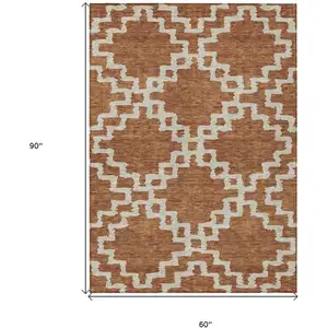 Photo of Brown And Ivory Geometric Washable Indoor Outdoor Area Rug