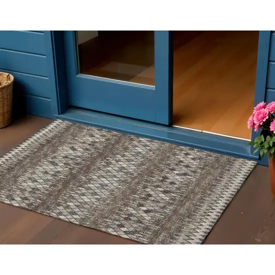 Brown And Ivory Ikat Washable Indoor Outdoor Area Rug Photo 1