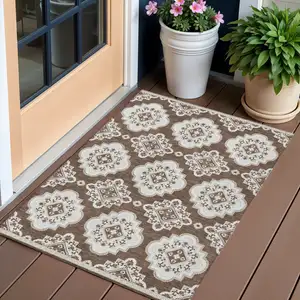 Photo of Brown And Ivory Medallion Washable Indoor Outdoor Area Rug