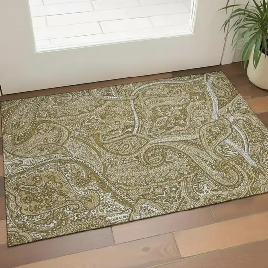 Brown And Ivory Paisley Washable Area Rug With UV Protection Photo 1