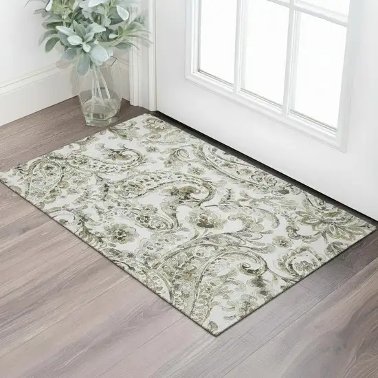 Brown And Ivory Paisley Washable Area Rug With UV Protection Photo 1