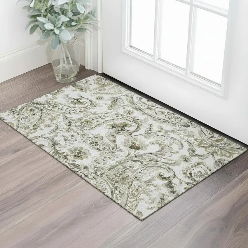 Brown And Ivory Paisley Washable Area Rug With UV Protection Photo 1