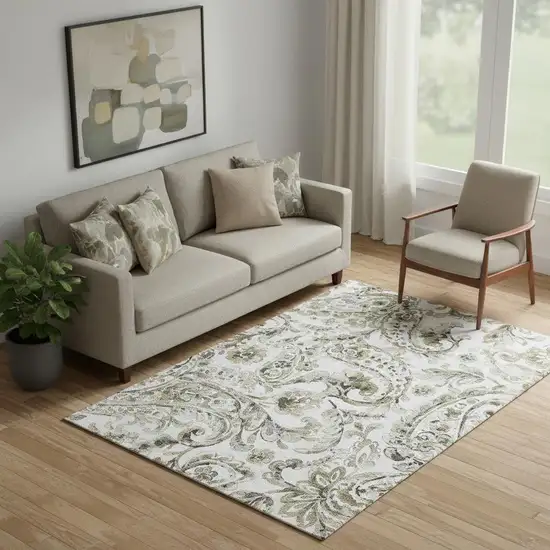 Brown And Ivory Paisley Washable Area Rug With UV Protection Photo 1