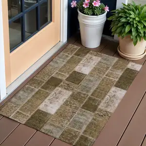 Photo of Brown And Ivory Patchwork Washable Indoor Outdoor Area Rug