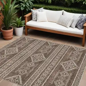 Photo of Brown And Ivory Southwestern Washable Indoor Outdoor Area Rug
