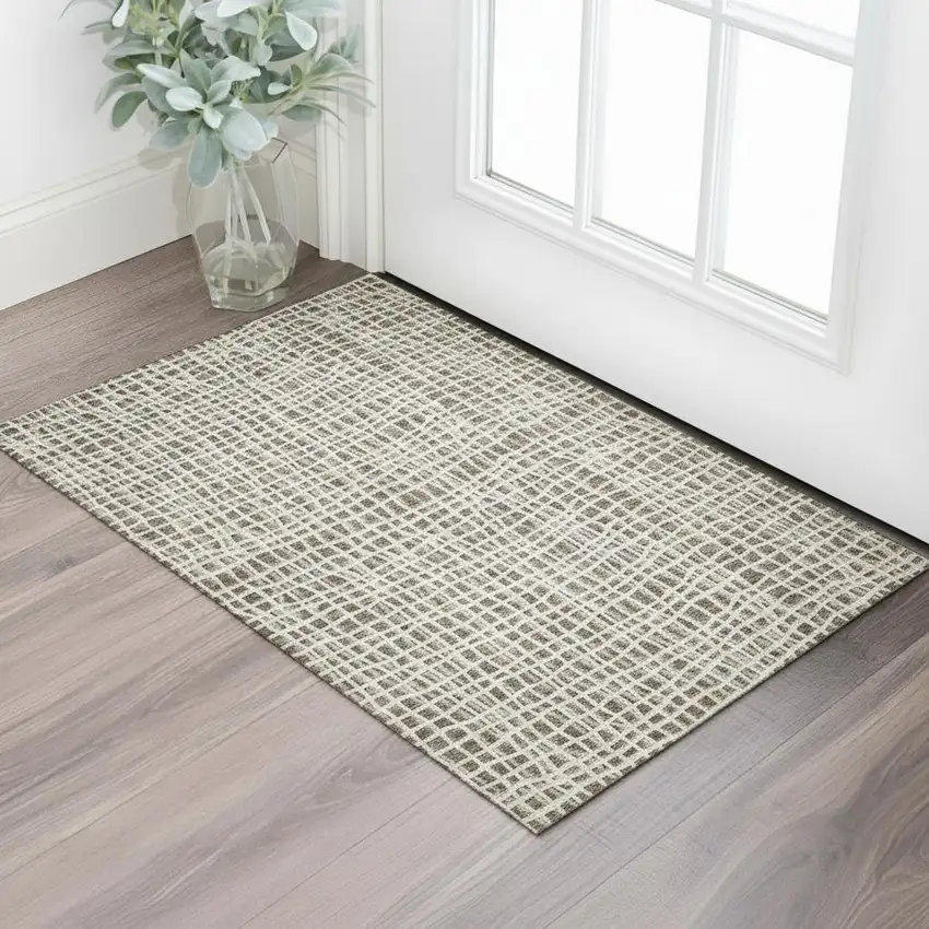 Brown And Ivory Striped Washable Area Rug With UV Protection Photo 1