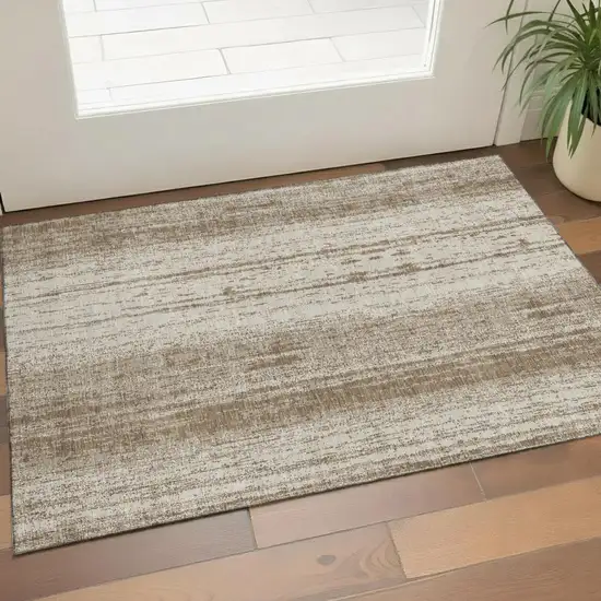 Brown And Ivory Striped Washable Area Rug With UV Protection Photo 1