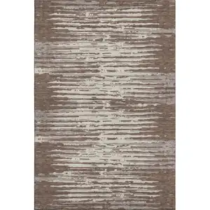 Photo of Brown And Ivory Striped Washable Area Rug With UV Protection