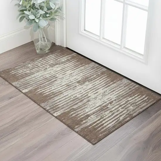 Brown And Ivory Striped Washable Area Rug With UV Protection Photo 1