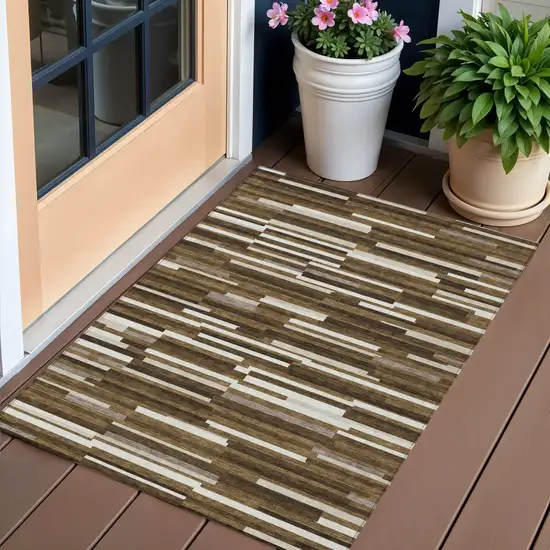 Brown And Ivory Striped Washable Indoor Outdoor Area Rug Photo 1