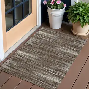 Photo of Brown And Ivory Striped Washable Indoor Outdoor Area Rug