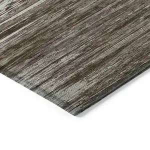 Photo of Brown And Ivory Striped Washable Indoor Outdoor Area Rug