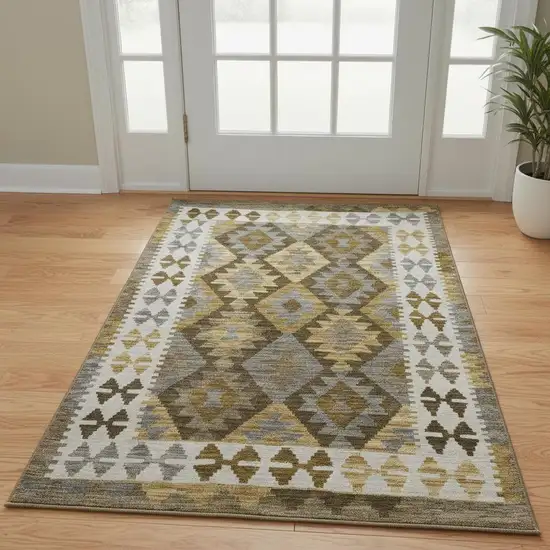 Brown And Ivory Tribal Washable Area Rug With UV Protection Photo 2