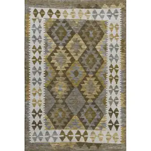 Photo of Brown And Ivory Tribal Washable Area Rug With UV Protection