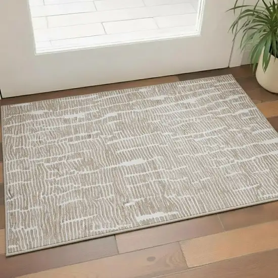 Brown And Ivory Vermicular Washable Area Rug With UV Protection Photo 1