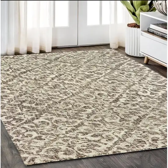 Brown And Ivory Wool Floral Hand Tufted Area Rug Photo 1