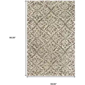 Photo of Brown And Ivory Wool Floral Hand Tufted Area Rug