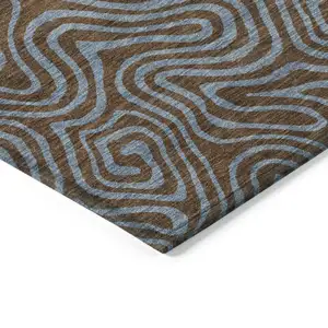 Photo of Brown And Light Blue Abstract Washable Indoor Outdoor Area Rug