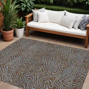 Photo of Brown And Light Blue Abstract Washable Indoor Outdoor Area Rug