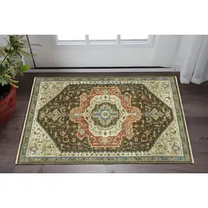 Photo of Brown And Orange Oriental Area Rug With Fringe