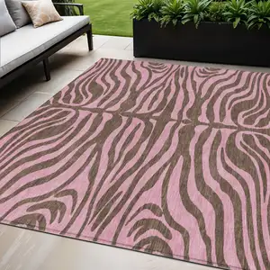 Photo of Brown And Pink Animal Print Washable Indoor Outdoor Area Rug
