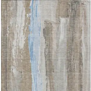 Photo of Brown And Sky Blue Abstract Washable Indoor Outdoor Area Rug