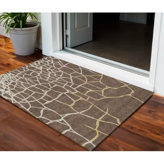 Brown And Tan Abstract Washable Indoor Outdoor Area Rug Photo 1