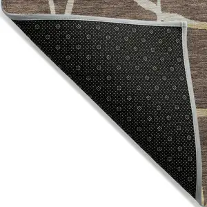 Photo of Brown And Tan Abstract Washable Indoor Outdoor Area Rug