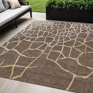 Photo of Brown And Tan Abstract Washable Indoor Outdoor Area Rug