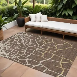 Photo of Brown And Tan Abstract Washable Indoor Outdoor Area Rug