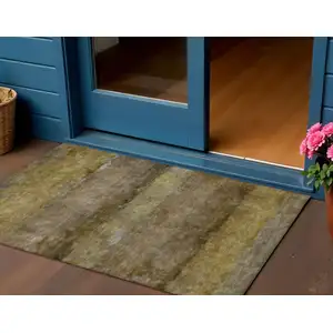 Photo of Brown And Taupe Abstract Washable Indoor Outdoor Area Rug
