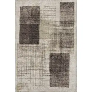 Photo of Brown And Taupe Geometric Washable Area Rug With UV Protection