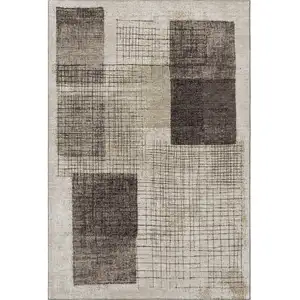Photo of Brown And Taupe Geometric Washable Area Rug With UV Protection