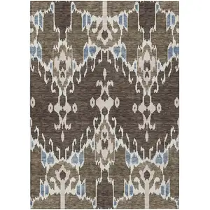 Photo of Brown And Taupe Ikat Washable Indoor Outdoor Area Rug