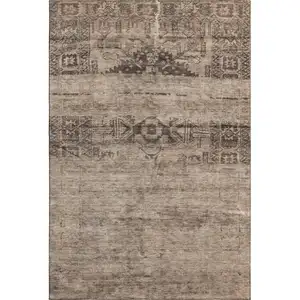 Photo of Brown And Taupe Oriental Washable Area Rug With UV Protection